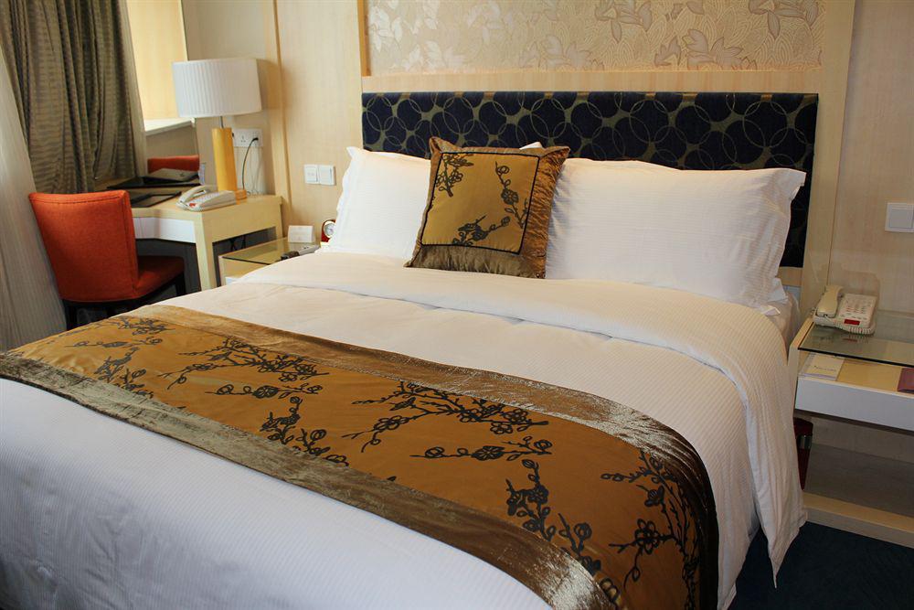 Puxi New Century Hotel Shanghái Habitación foto
